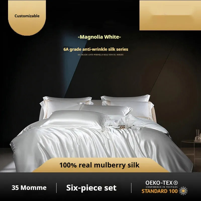 Silk quilt cover four-piece bedding set in solid colour with matching sheets