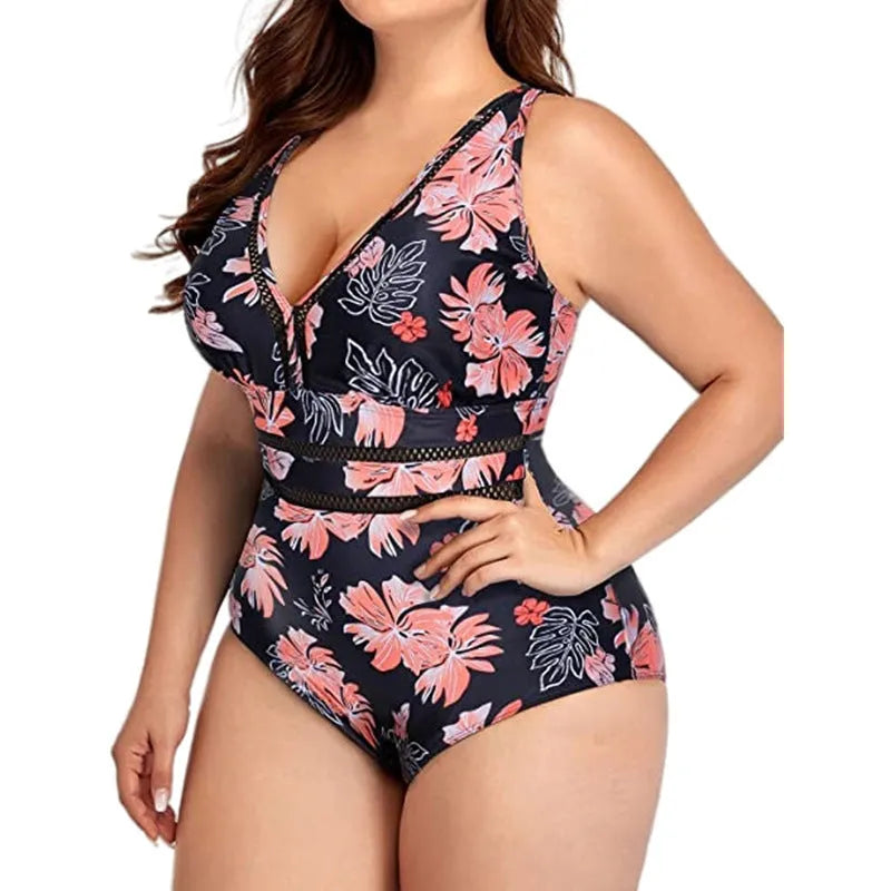 Women's plus size black printed mesh bikini swimsuit showing sleeveless design