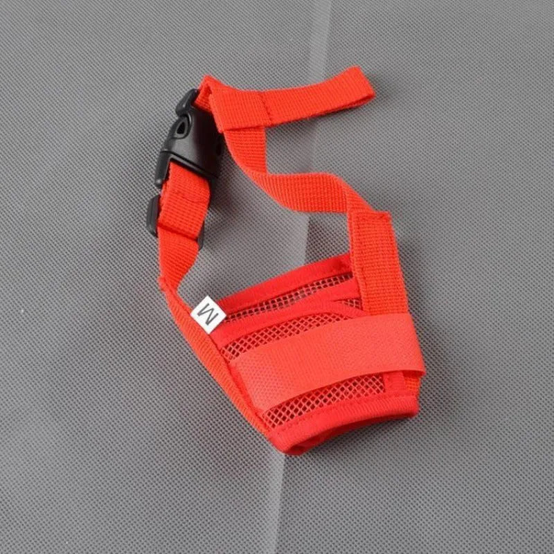A black adjustable plastic mesh dog muzzle shown on a size chart with options for blue, pink, purple, and red.