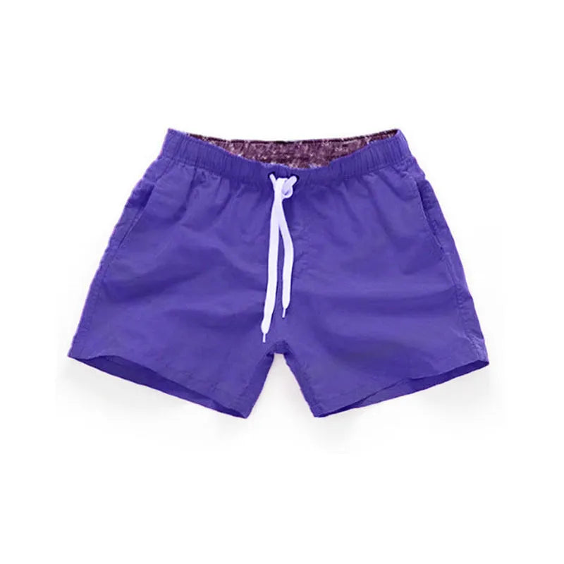 Men's polyester beach shorts in multiple colours with straight leg design for surfing and summer wear, available in sizes S to 4XL