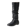 Women's black slip-on flat high cylinder boots with a round toe and rubber sole.