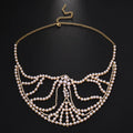 Geometric alloy mask with electroplated finish and gemstone decoration in silver colour