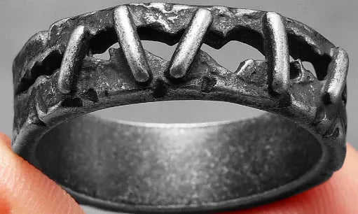 Stainless steel double ring with dark punk styling on finger