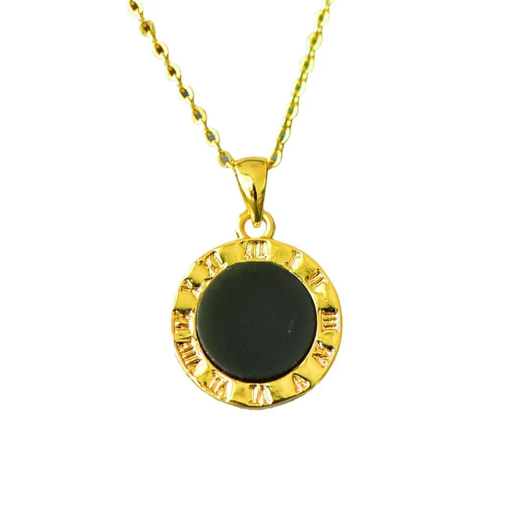 Flat grey Hetian jade pendant with copper metal inlay and small ink blue jade accents on a necklace chain.
