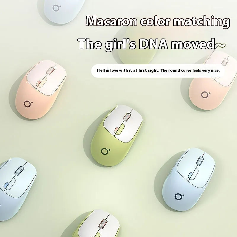 Mute wireless Bluetooth computer mouse in Matcha Green colour on a desk
