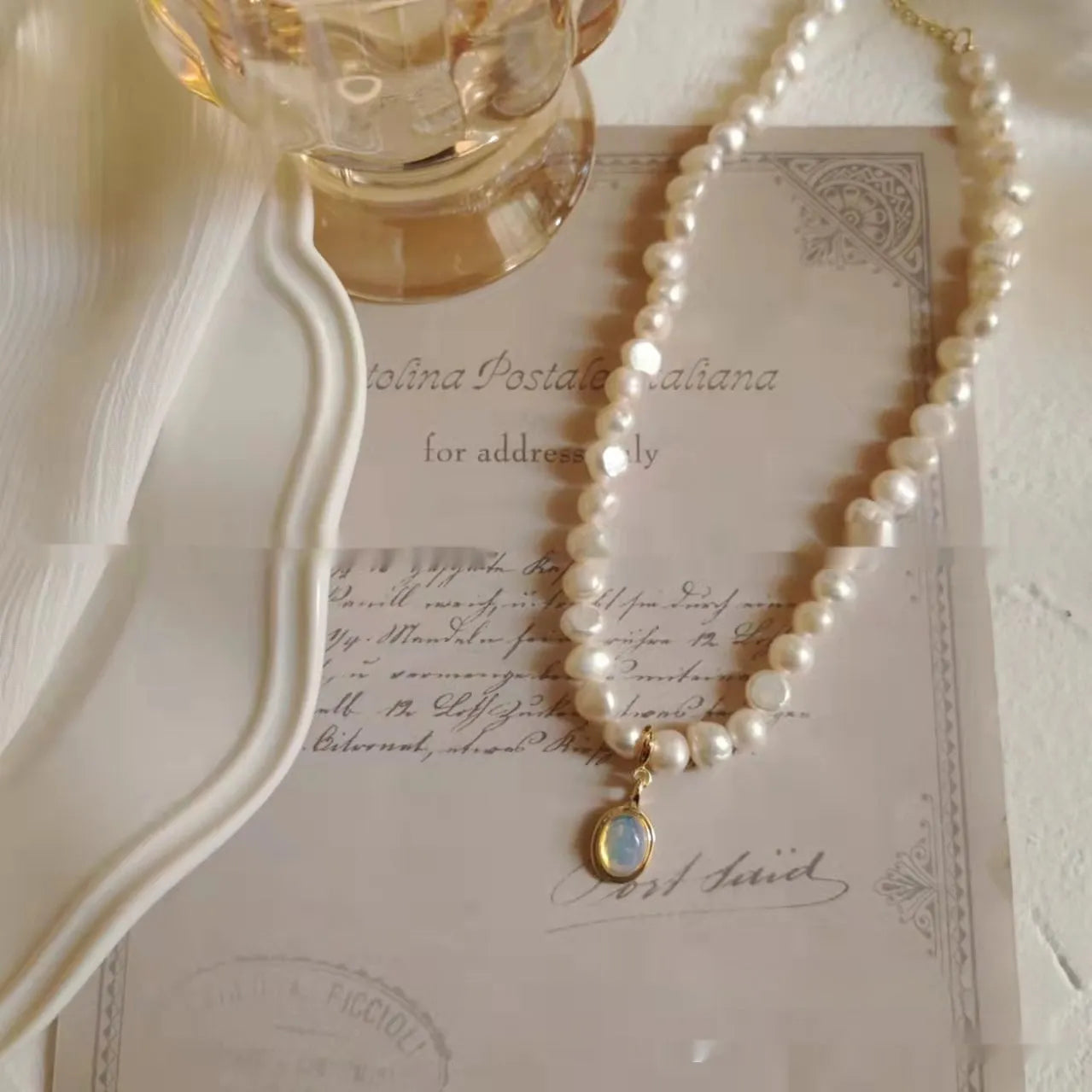 French Court vintage-style alloy necklace with a geometric charm on an adjustable chain.