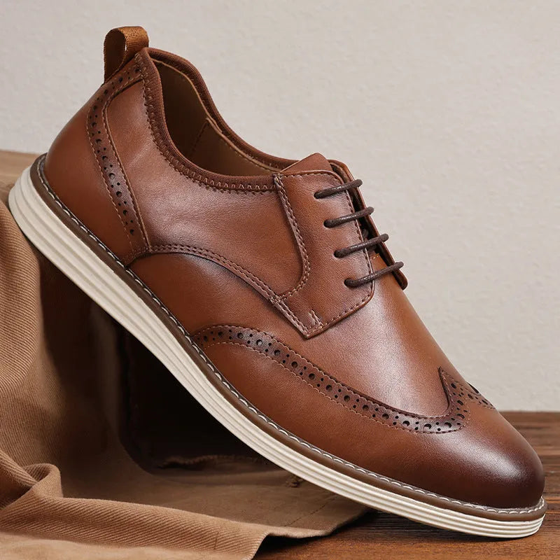 Men's black and brown slip-on business casual shoes with PU upper and carved detailing