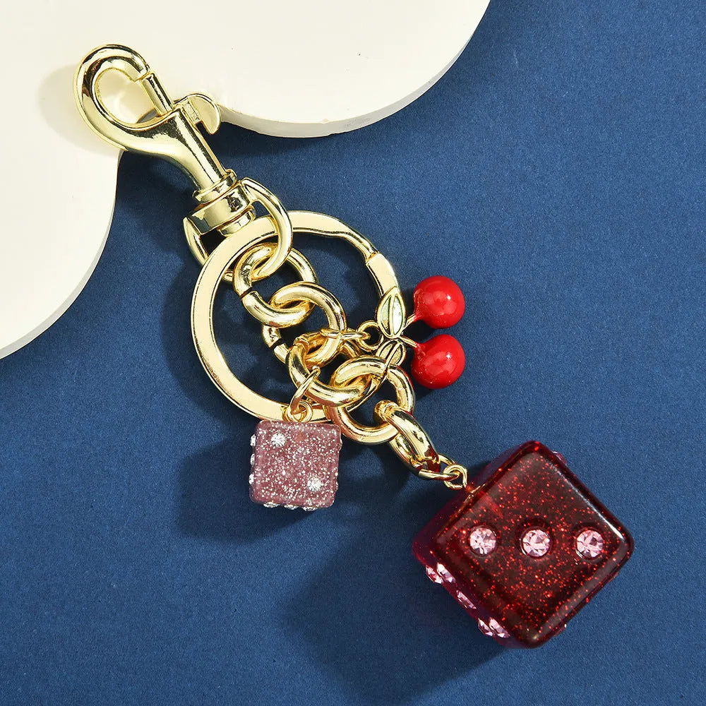 Square metal dice keychain pendant with cherry two-tone electroplated finish