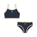 Dark blue split colour baby girls' swim briefs made from polyester and Lycra fabric.