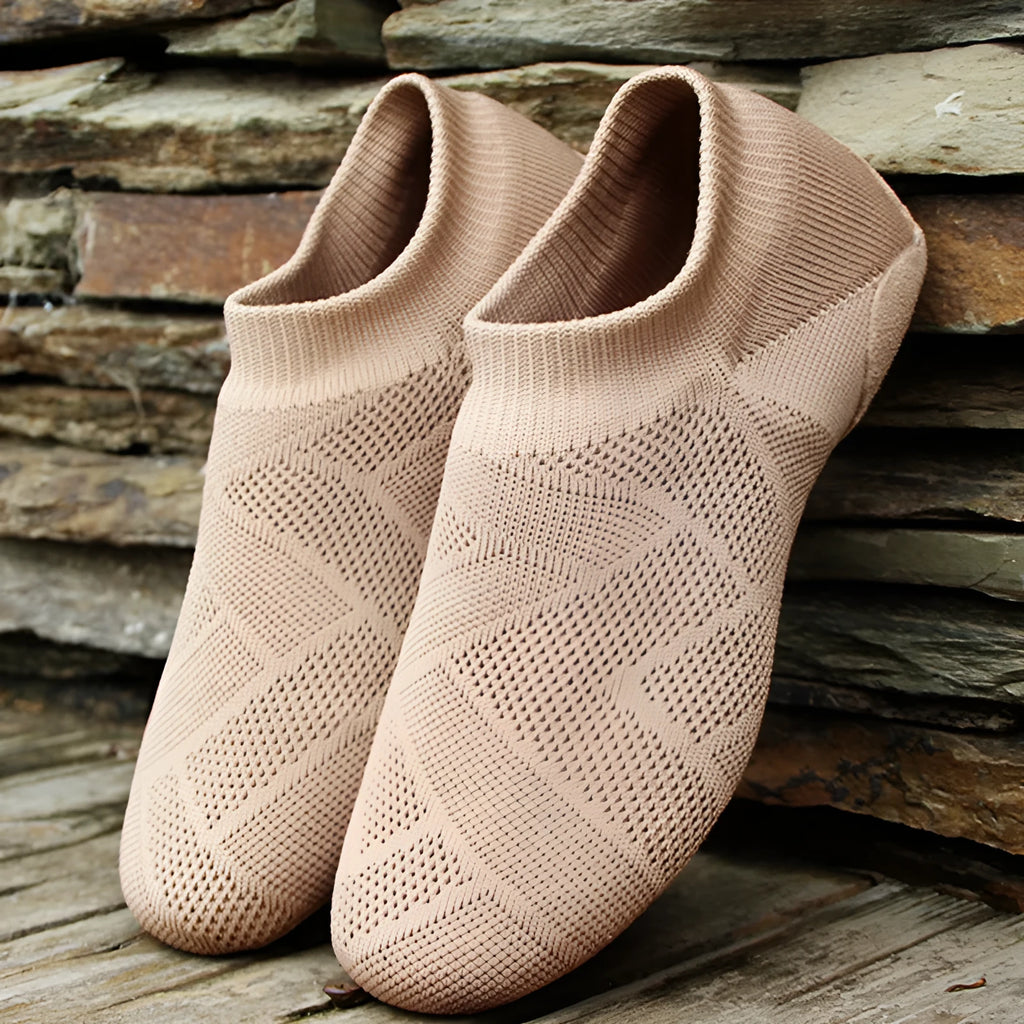 Camel coloured Latin dance shoes with cotton mesh upper and leather sole.