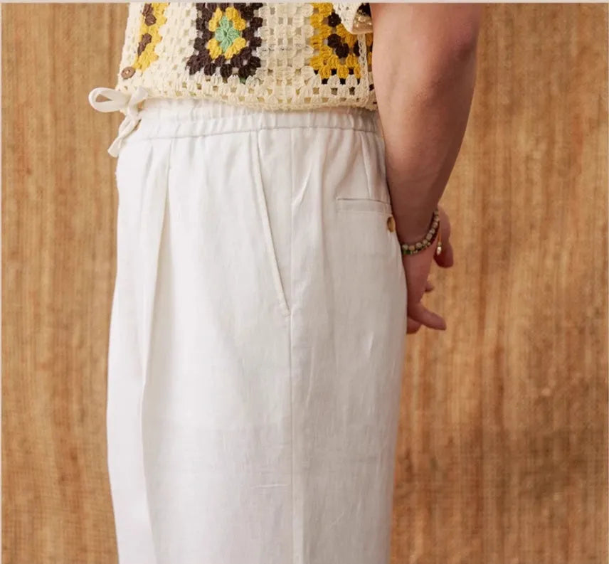Women's linen trousers in high-waisted loose fit with elasticated waistband in navy blue colour