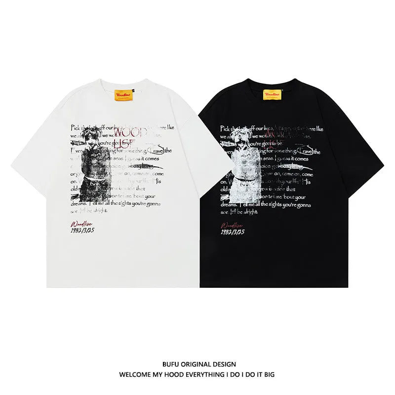 Men's black loose-fit pure cotton t-shirt with white printed letter design and raglan sleeves.