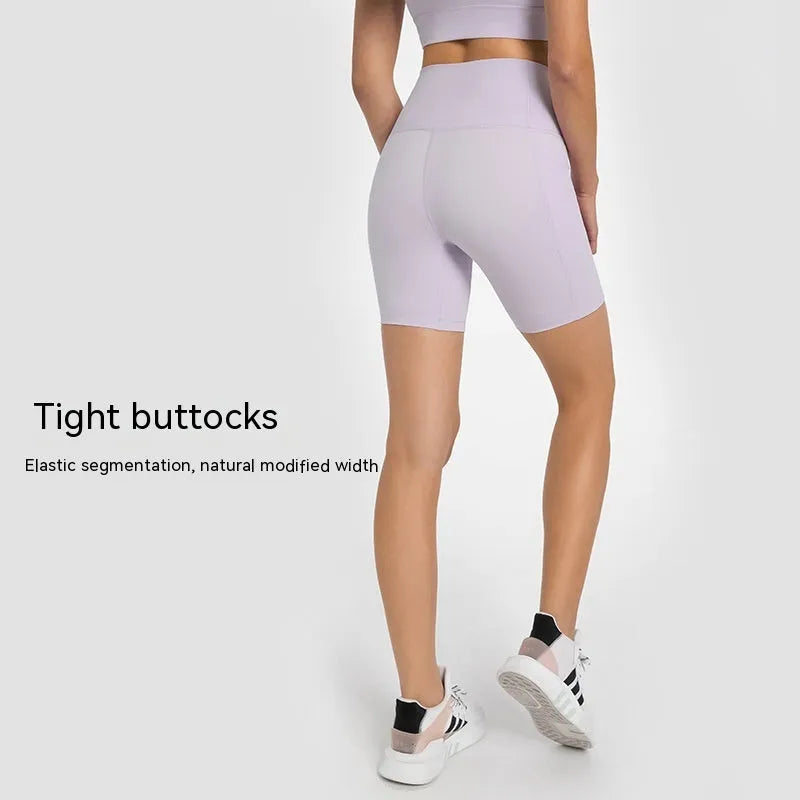 Women's mid-length sports shorts in four colours with super stretch cotton blend fabric for athletic activities