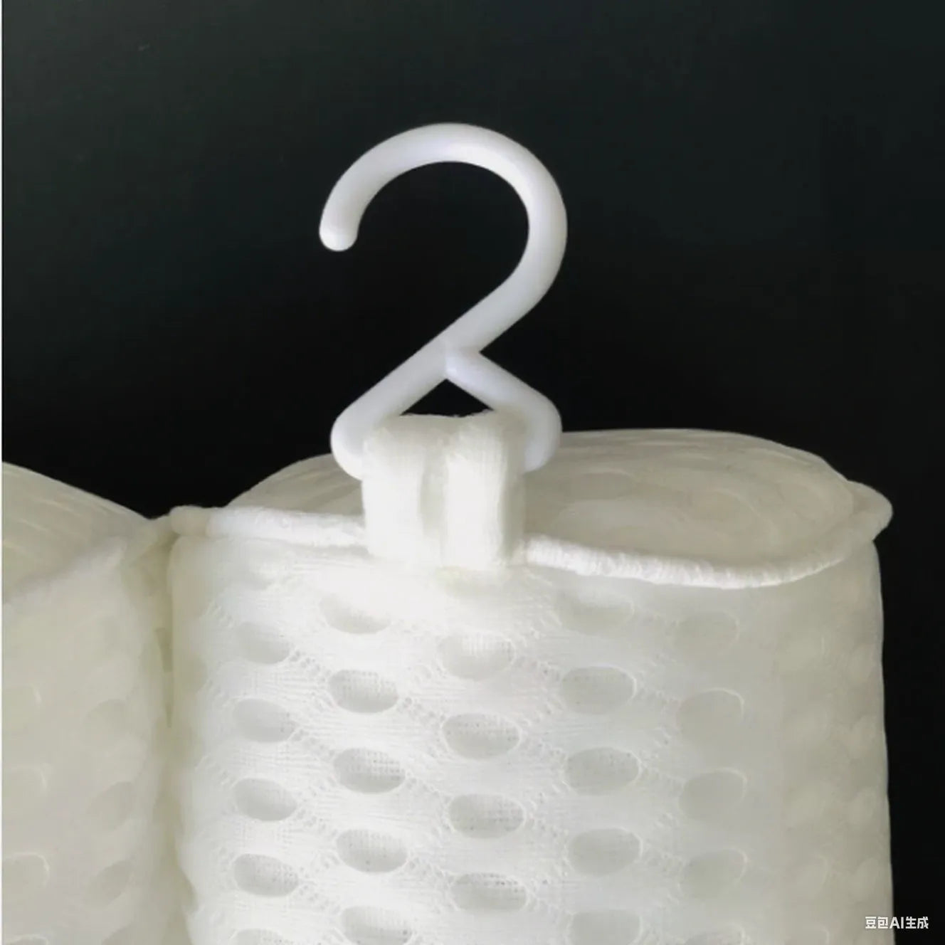 White breathable 3D bathtub pillow with seven suction cups on a bathtub edge.