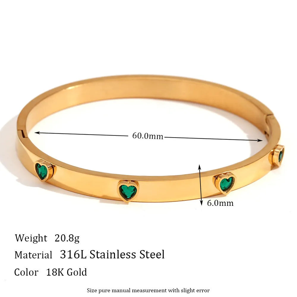 Stainless steel women's bracelet with micro-inlaid peach heart charm in golden electroplated finish