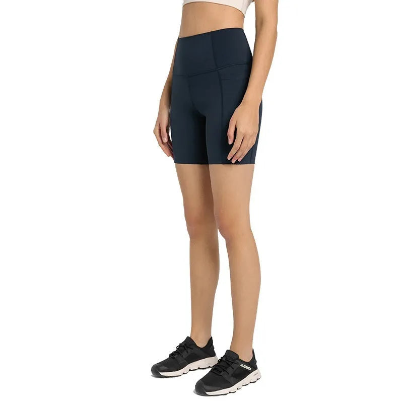 Women's mid-length sports shorts in four colours with super stretch cotton blend fabric for athletic activities
