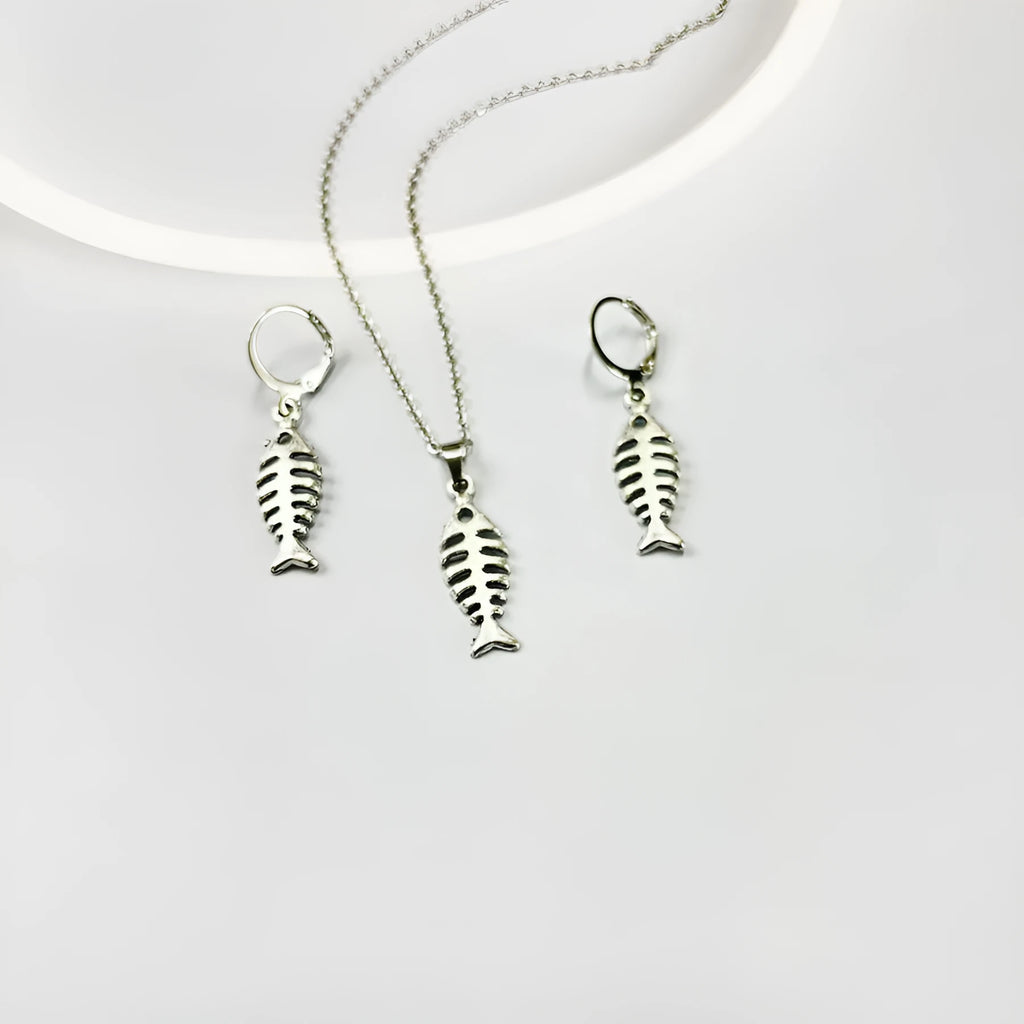 Silver-colour fishbone pendant necklace with O-chain and matching earrings on grey background