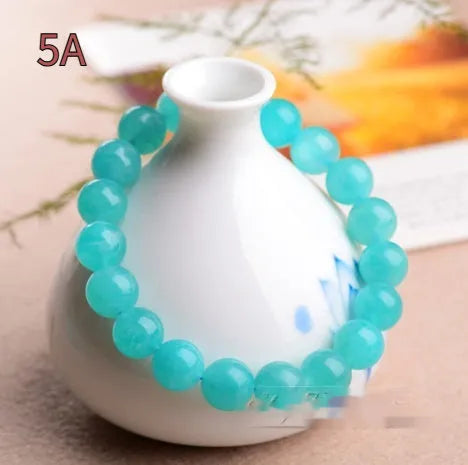 7A grade Amazonite natural stone scattered beads in various sizes from 6mm to 13mm with polished surfaces
