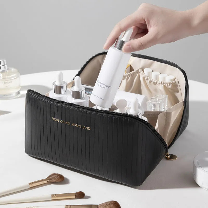 Cubic PU makeup bag with vertical pattern pillow design measuring 22.5cm