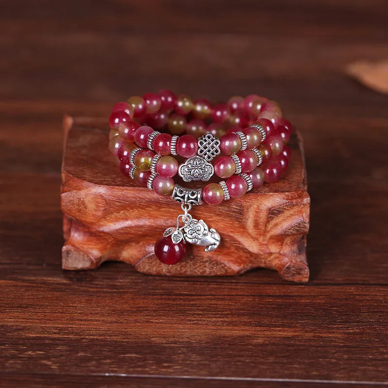 Natural watermelon crystal bracelet with Chinese knot and geometric beads in elephant style