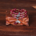 Natural watermelon crystal bracelet with Chinese knot and geometric beads in elephant style