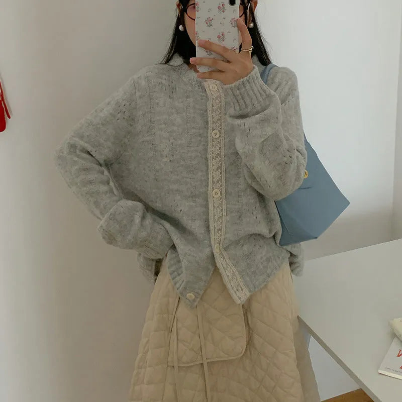 Art retro style loose-fit sweater coat in viscose fibre, shown in apricot colour.