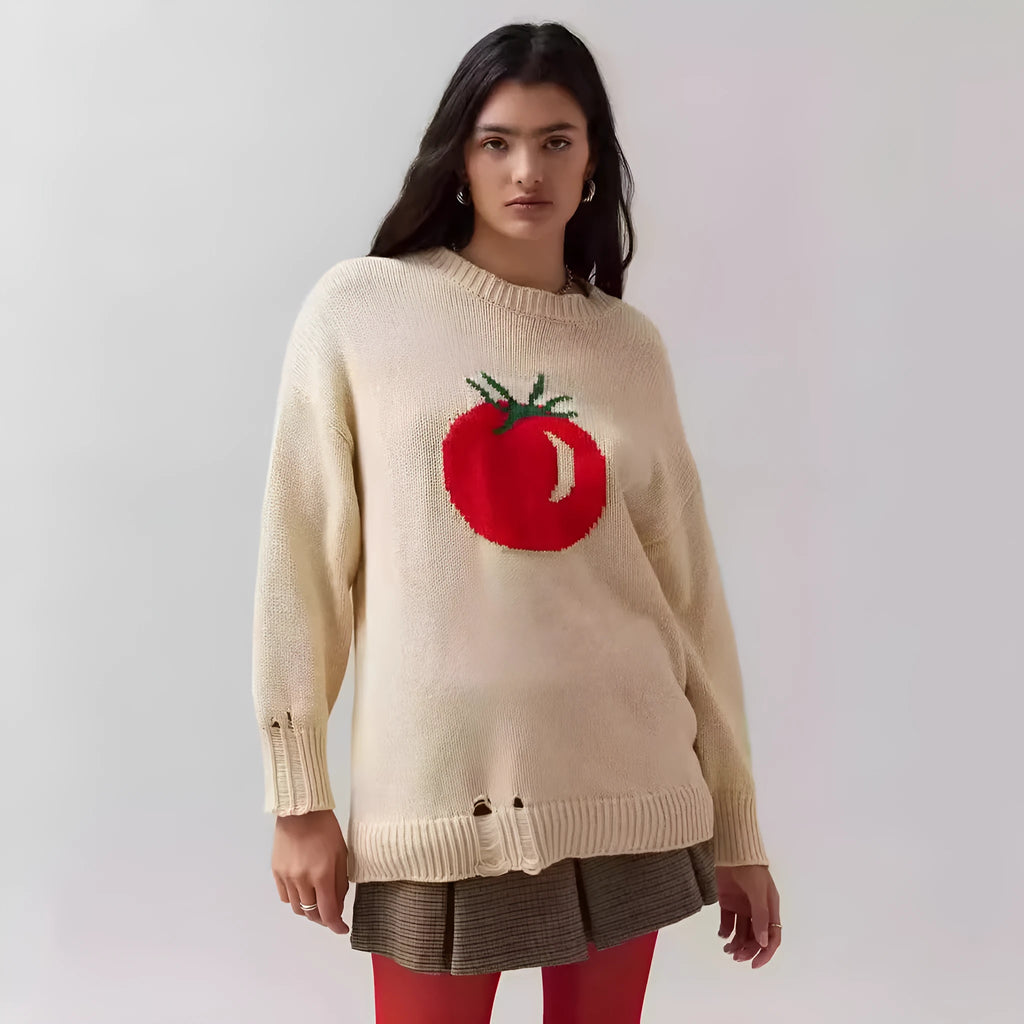 Women's milky white acrylic round neck sweater with jacquard long sleeves, laid flat.