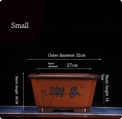 Large purple clay Chinese style flower pot for indoor bonsai or plants.