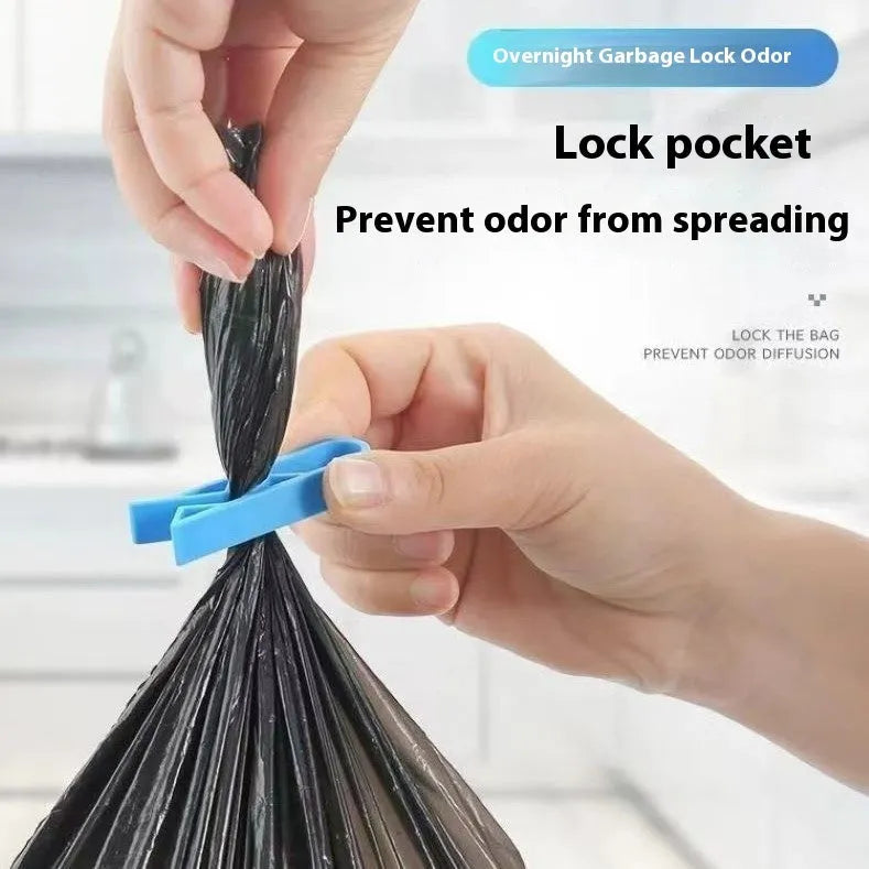 A white PP plastic non-slip clip designed to secure a garbage bag to the side of a trash can.