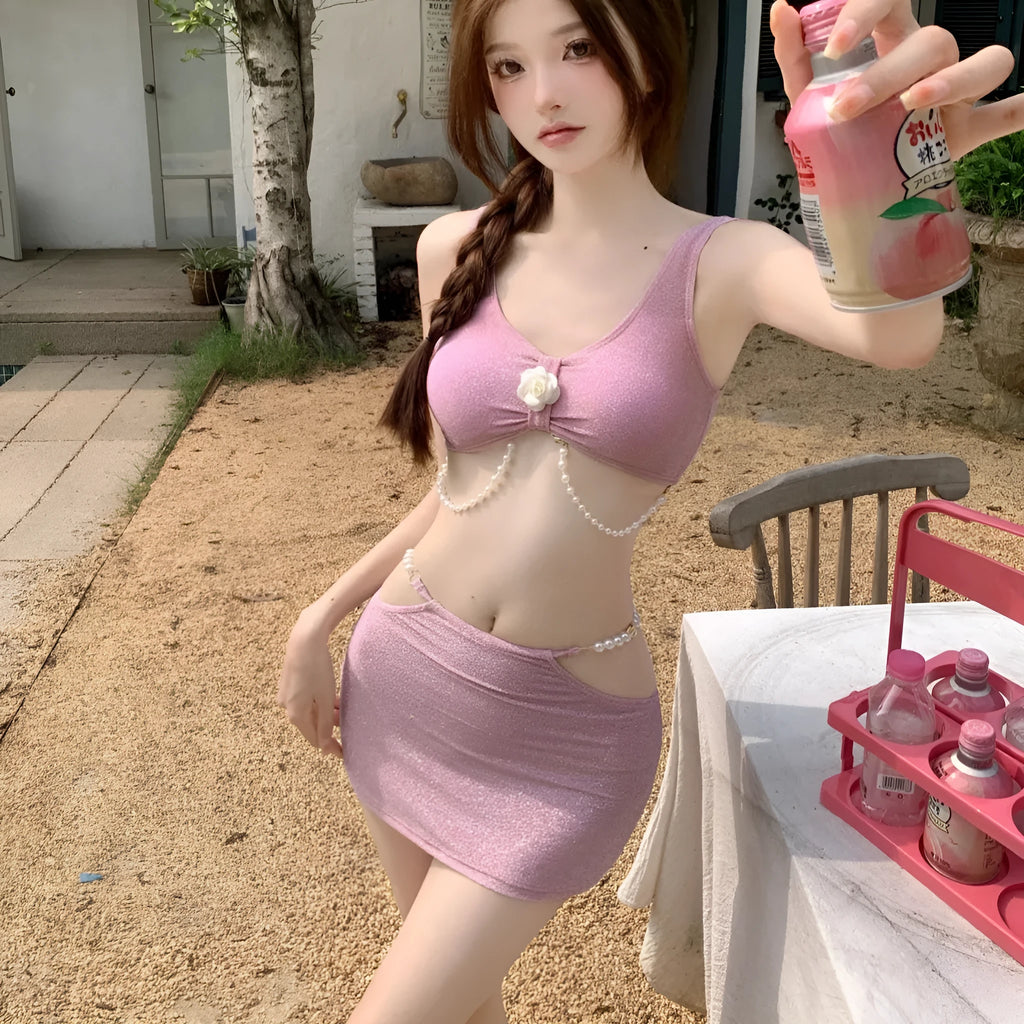 Bear Vacation pink and black three-piece polyester bikini set for women.