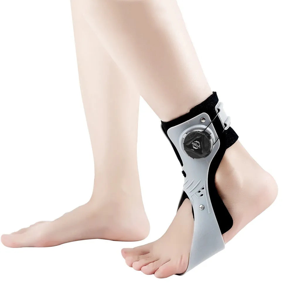 Grey ankle support brace with airbag button adjustment for training rehabilitation