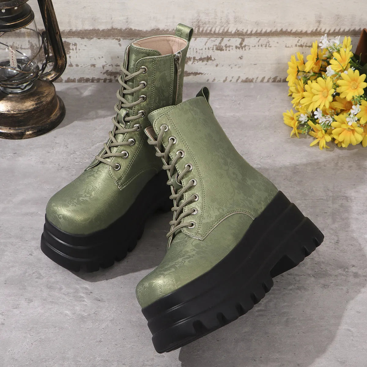 Women's white retro platform boots with patchwork PU upper and chunky rubber sole.
