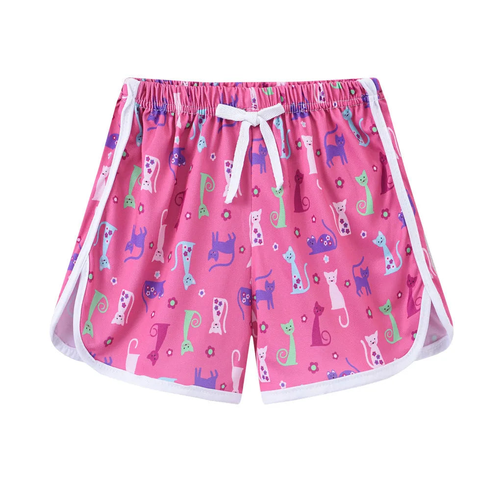 Children's polyester beach shorts in various colors and patterns including pineapple and kitten designs for sizes 100 to 140