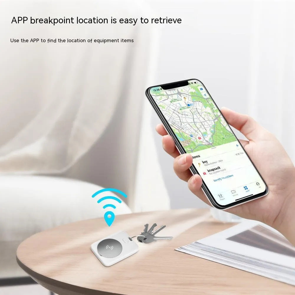 White ABS plastic pet tracking device showing portable attachment method