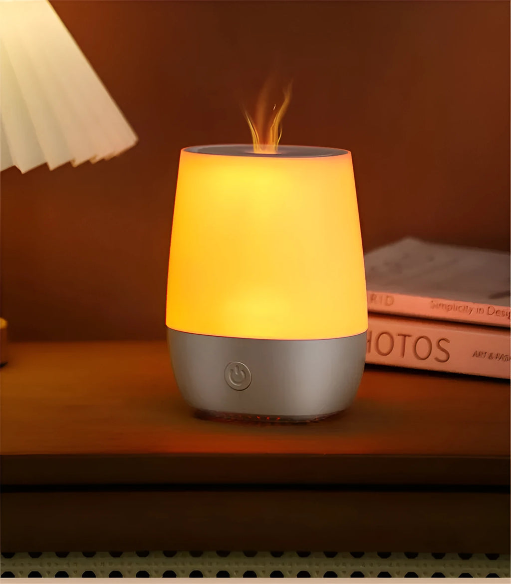 White USB aroma diffuser with simulated flame effect showing mist output