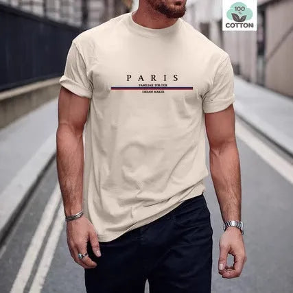 Man wearing a heavy grey pure cotton T-shirt with a printed letter design and short sleeves.