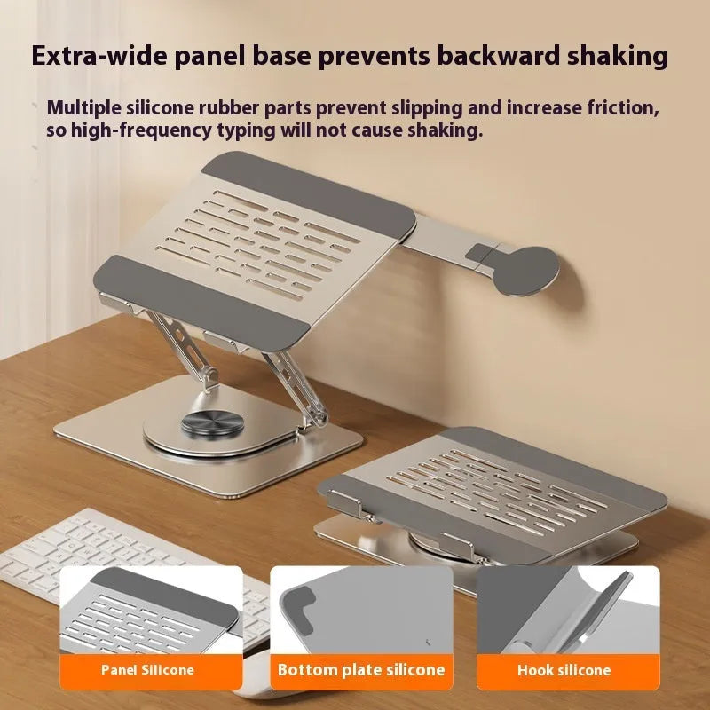 Silver carbon steel laptop stand with rotating top and a side-mounted magnetic mobile phone holder.