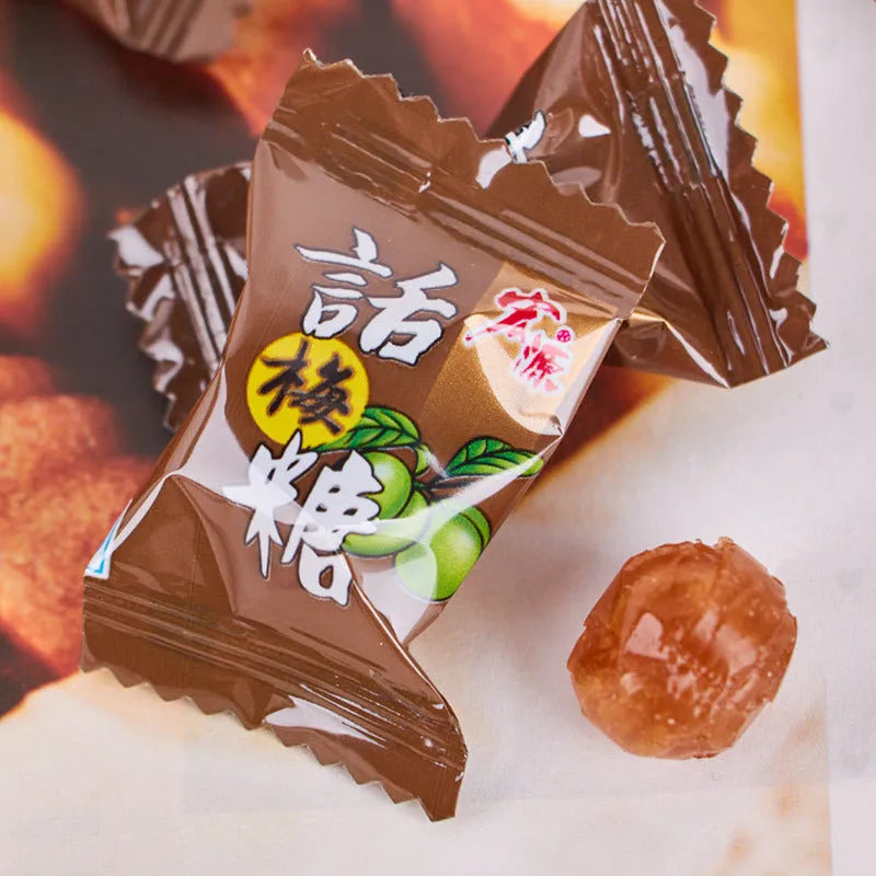 Three bags of Asian fruit hard candies: guava, plum sugar, and tangerine peel flavours