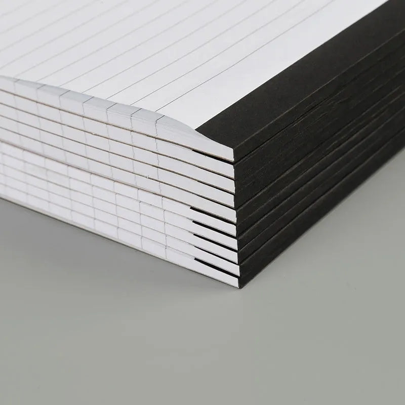 A4 tearable note pad with wireless adhesive binding showing grid and lined format options