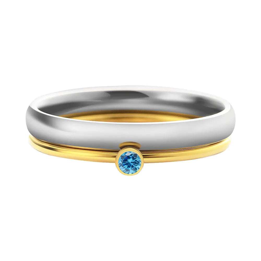 Titanium steel December birthstone ring with electroplated finish, engraved geometry shape, and gold handle.