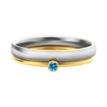 Titanium steel December birthstone ring with electroplated finish, engraved geometry shape, and gold handle.