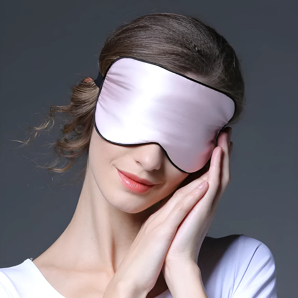Double-sided mulberry silk sleep mask showing embroidered print in a selection of its 22 colour options.