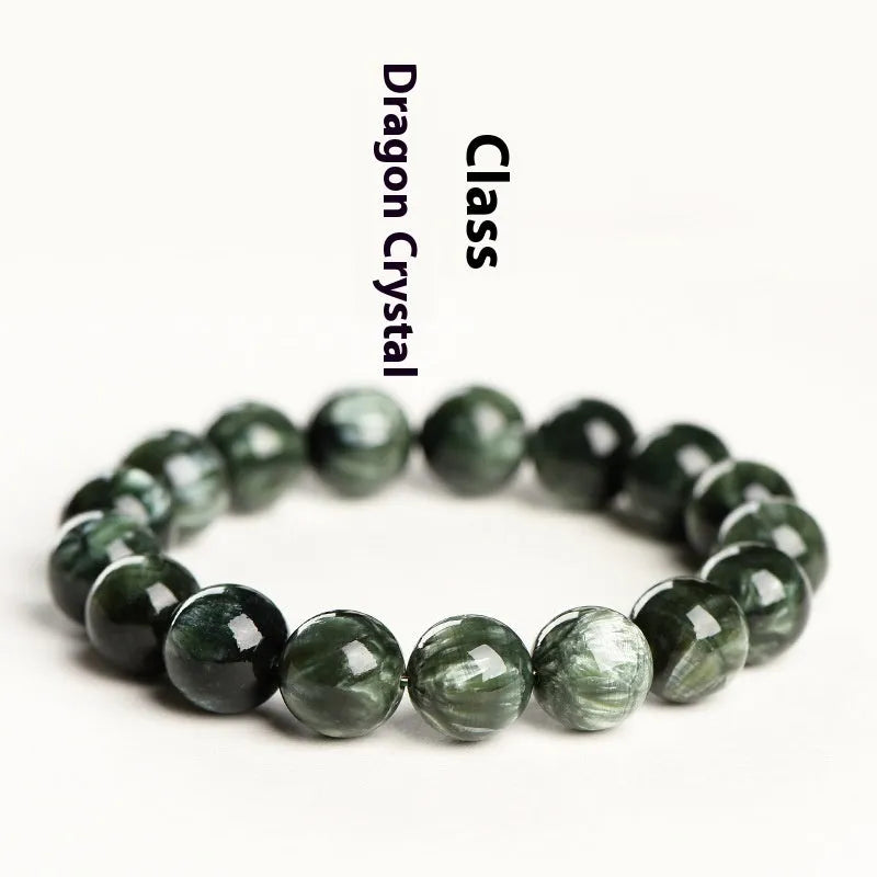 A single-ring green dragon crystal bracelet with round beads and a ruyi design element.