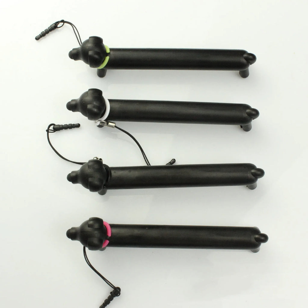 Black dog-shaped touch screen stylus with conductive silicone body on white background