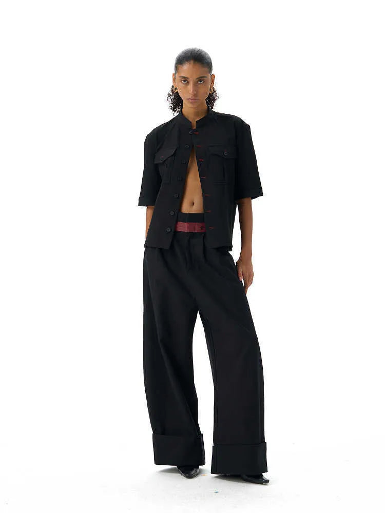 Black handmade red eye hunting shirt with half sleeves, shirt collar, and single-breasted placket.