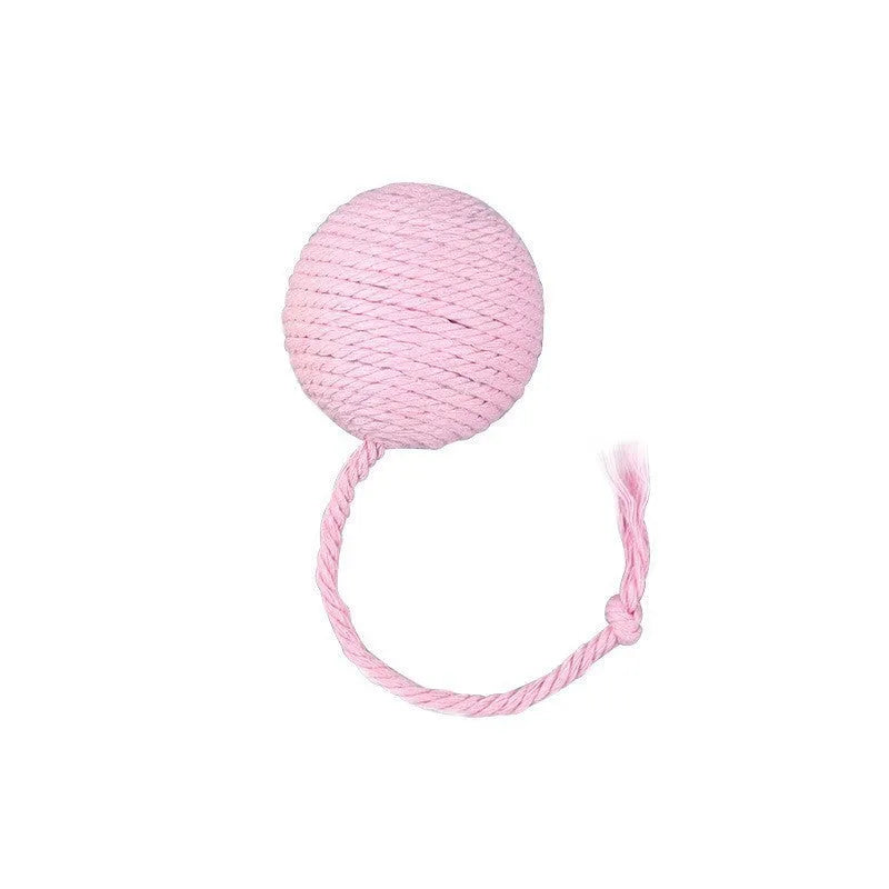 Green cat toy ball with a rope handle looped through it, shown next to a smaller pink version.