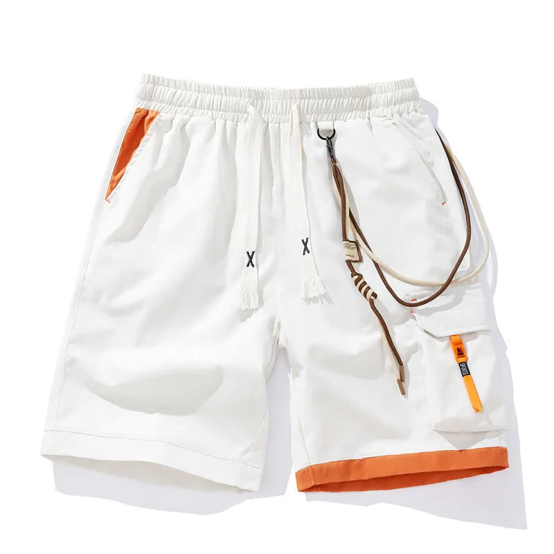Man wearing coffee-coloured loose-fit bamboo fibre plus size sports shorts with a high waist.