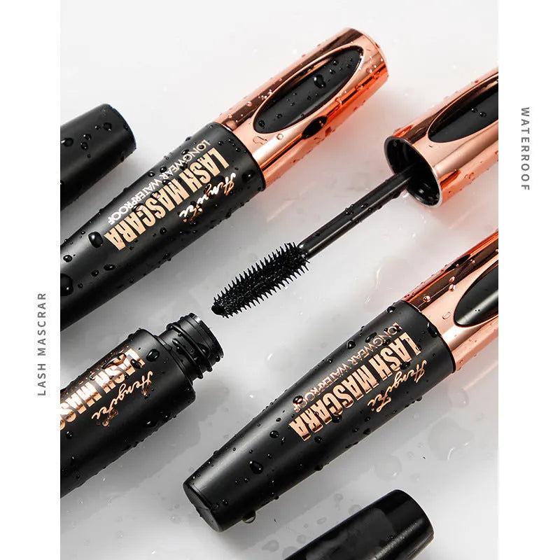 Black waterproof mascara tube for thick, long, curled lashes, shown with colour box and opp bag packaging.