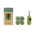 Rolls of green, black, blue, purple, and orange EPI degradable pet poo bags with a plastic dispenser.