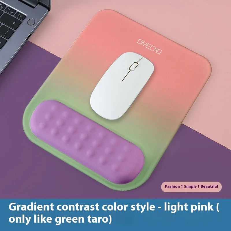 Ergonomic mouse pad with raised wrist support in cloth silicone material showing colour options